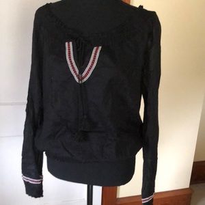 Miley Cyrus peasant blouse.